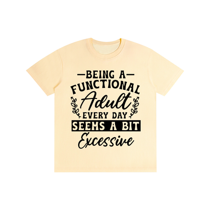 Cream unisex t-shirt with a bold and cursive funny adulting quote printed across the chest