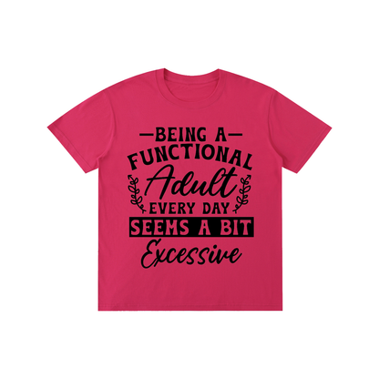 Raspberry red unisex t-shirt with a bold and cursive funny adulting quote printed across the chest