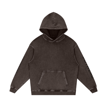 Dark brown snow wash oversized hoodie with a kangaroo pocket and sleeve lettering, front view