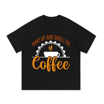 Black oversized cotton t-shirt with a rust brown Wake up and smell the coffee design with a white coffee cup and orange cursive Coffee on the front