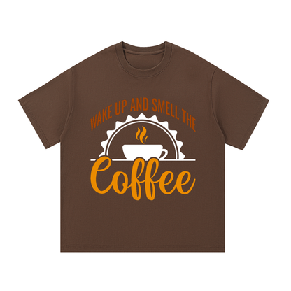 Coffee oversized cotton t-shirt with a rust brown Wake up and smell the coffee design with a white coffee cup and orange cursive Coffee on the front