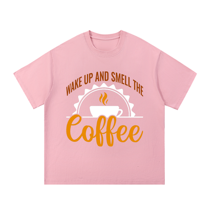 Pink oversized cotton t-shirt with a rust brown Wake up and smell the coffee design with a white coffee cup and orange cursive Coffee on the front