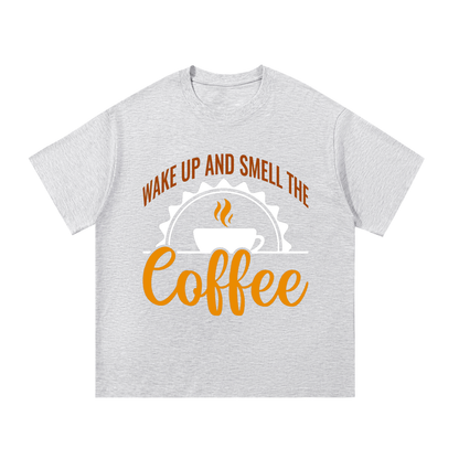 White Gray oversized cotton t-shirt with a rust brown Wake up and smell the coffee design with a white coffee cup and orange cursive Coffee on the front
