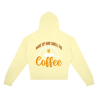 Light Yellow women's cropped drop shoulder hoodie with a rust brown Wake up and smell the coffee design with a white coffee cup and orange cursive Coffee on the back