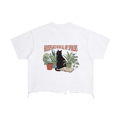 Unisex vintage-wash boxy tee with a distressed hem with a black cat beside houseplants and an open book, Houseplants Hear All My Spoilers back print