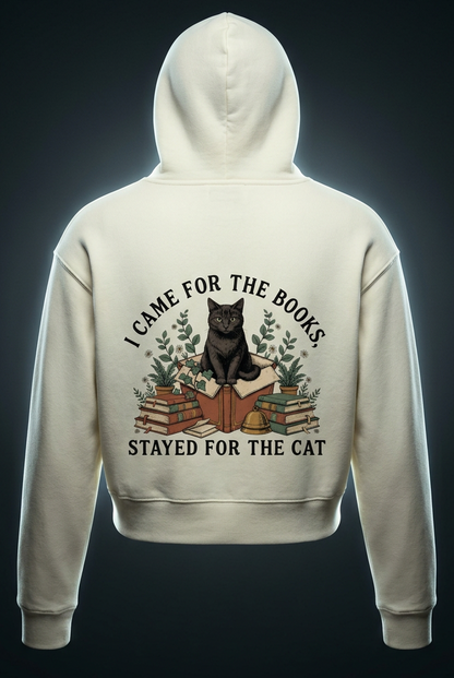 Women’s cropped drop-shoulder hoodie with a black cat on a stack of books and plants, I Came for the Books, Stayed for the Cat back print