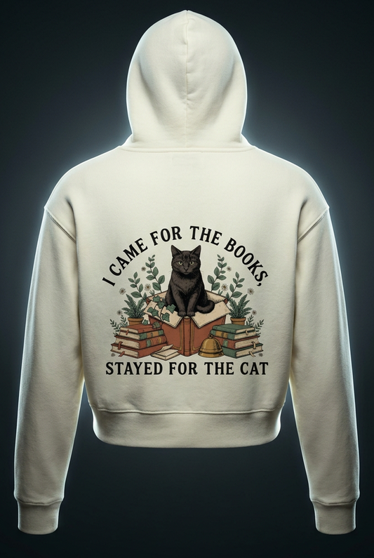 Women’s cropped drop-shoulder hoodie with a black cat on a stack of books and plants, I Came for the Books, Stayed for the Cat back print