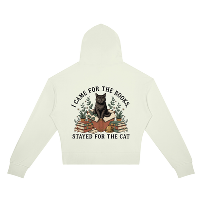 Women’s cropped drop-shoulder hoodie with a black cat on a stack of books and plants, I Came for the Books, Stayed for the Cat back print