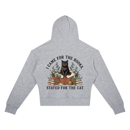 Women’s cropped drop-shoulder hoodie with a black cat on a stack of books and plants, I Came for the Books, Stayed for the Cat back print