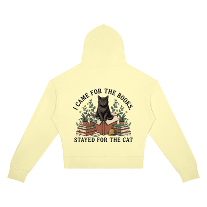 Women’s cropped drop-shoulder hoodie with a black cat on a stack of books and plants, I Came for the Books, Stayed for the Cat back print