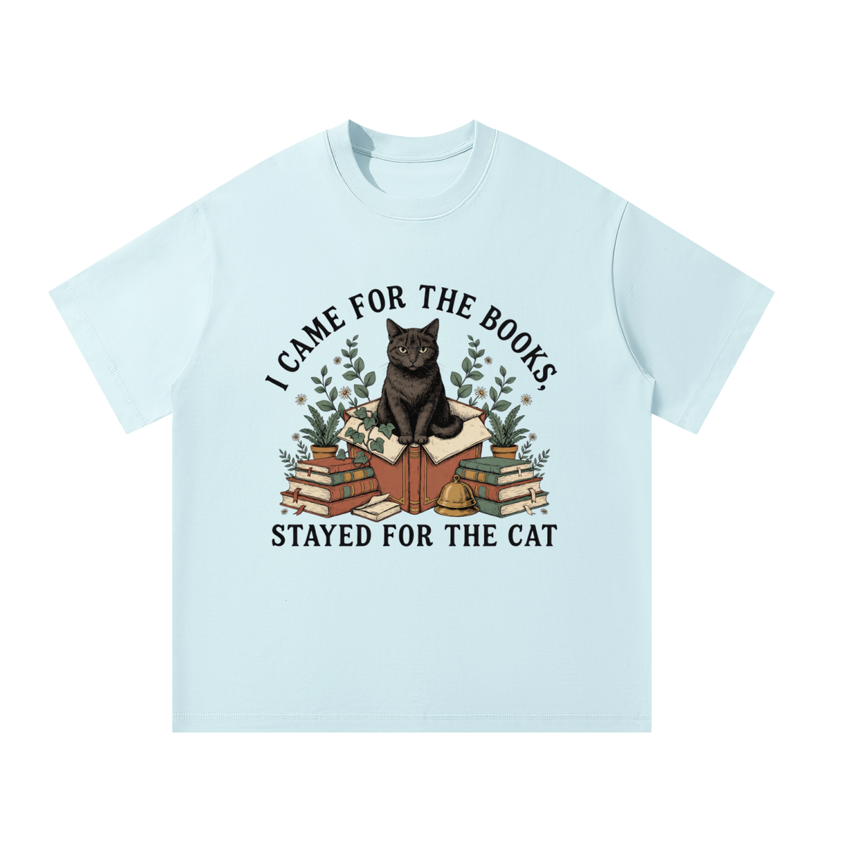 Unisex oversized heavyweight cotton tee with a black cat on a stack of books and plants, I Came for the Books, Stayed for the Cat front print
