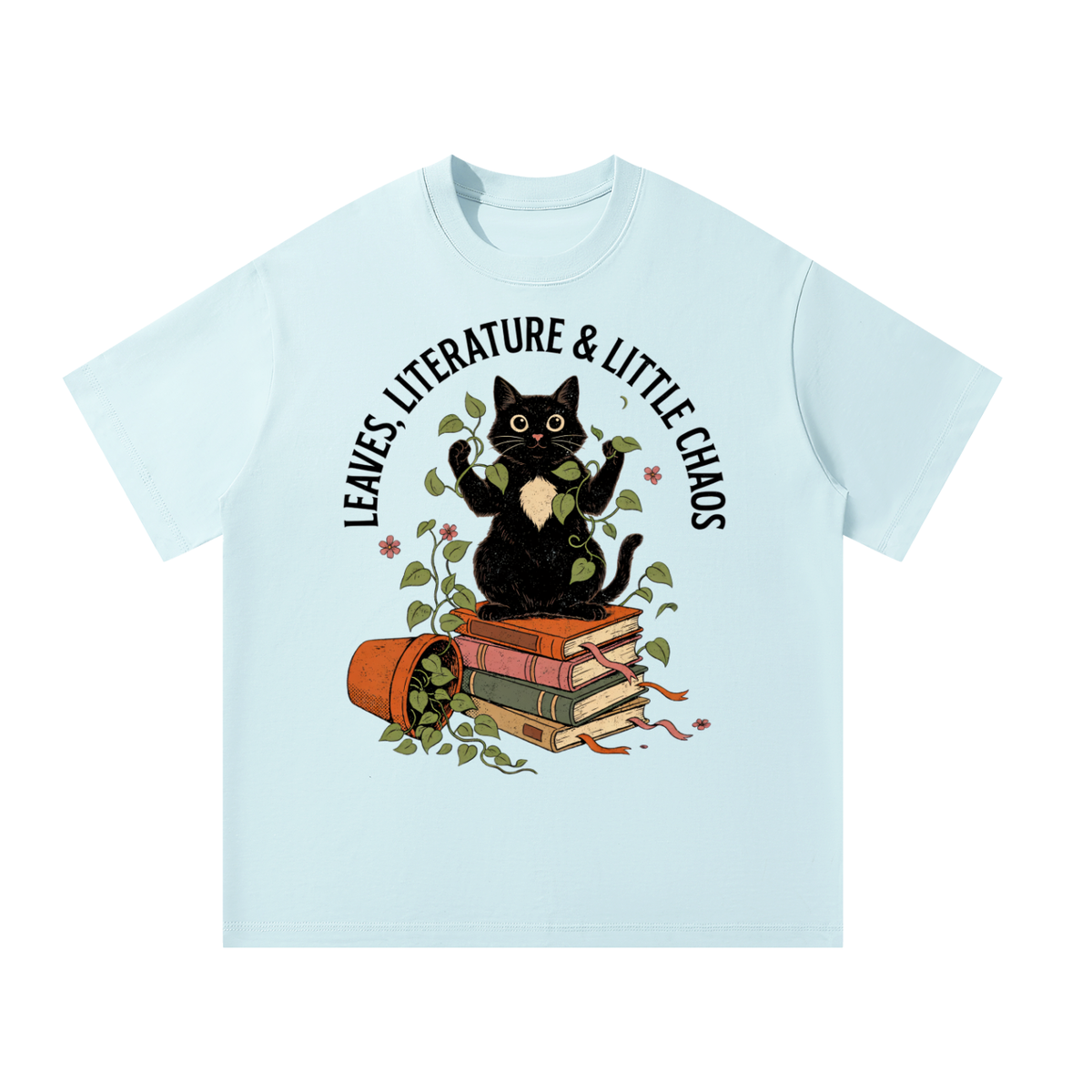Unisex oversized heavyweight cotton tee with a black cat on books beside a tipped plant pot, Leaves, Literature & Little Chaos front print