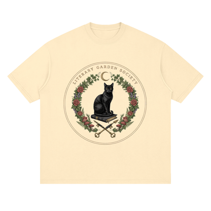 Women’s Literary Garden Society Oversized T-Shirt in cream with the black cat and roses crest, front print
