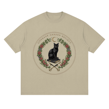 Women’s Literary Garden Society Oversized T-Shirt in khaki with the black cat and roses crest, front print