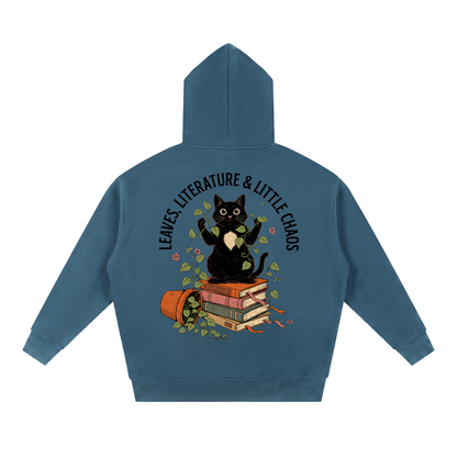 Black cat on a stack of books with vines, Leaves, Literature & Little Chaos back print on a Haze Blue fleece hoodie