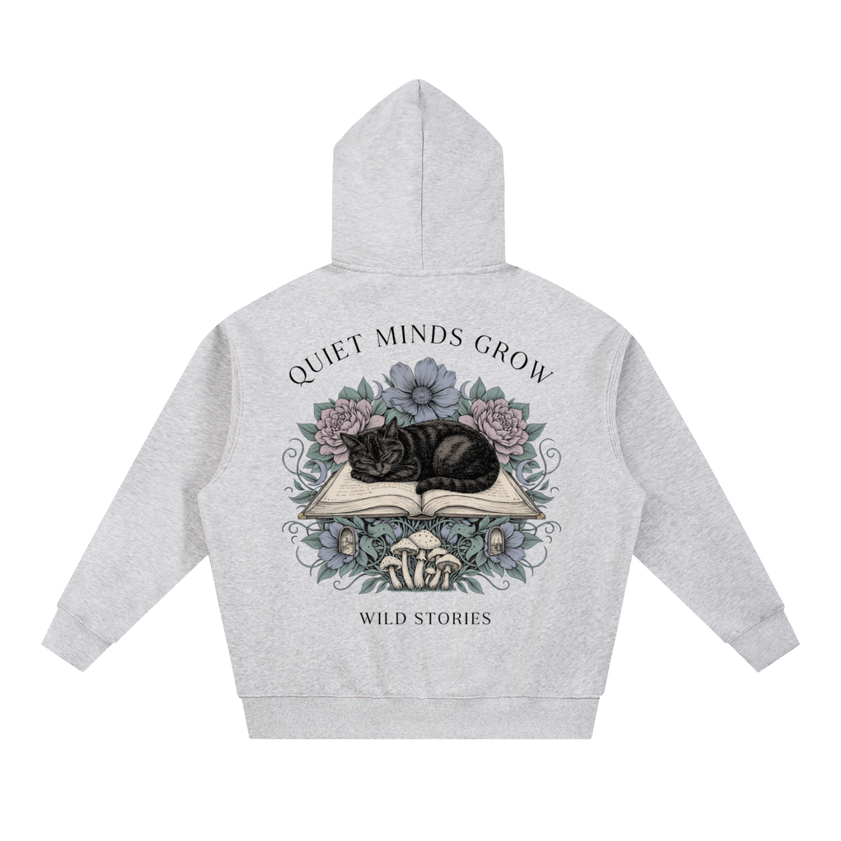 Unisex oversized boxy fleece hoodie with a sleeping black cat on an open book among flowers, Quiet Minds Grow, Wild Stories back print
