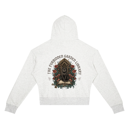 Women’s cropped drop-shoulder hoodie with a black cat in a gothic garden library doorway, The Forbidden Garden Library back print