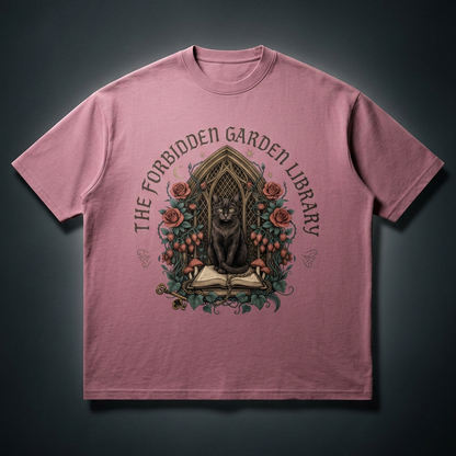 Unisex loose drop-shoulder tee with a black cat in a gothic garden library doorway, The Forbidden Garden Library front print