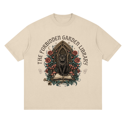 Unisex loose drop-shoulder tee with a black cat in a gothic garden library doorway, The Forbidden Garden Library front print
