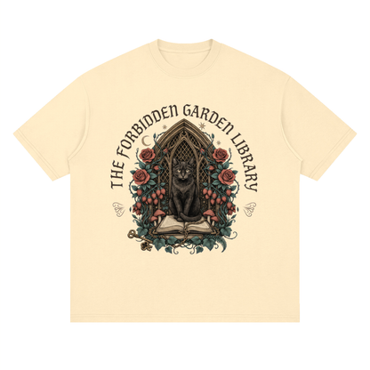 Unisex loose drop-shoulder tee with a black cat in a gothic garden library doorway, The Forbidden Garden Library front print