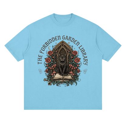 Unisex loose drop-shoulder tee with a black cat in a gothic garden library doorway, The Forbidden Garden Library front print