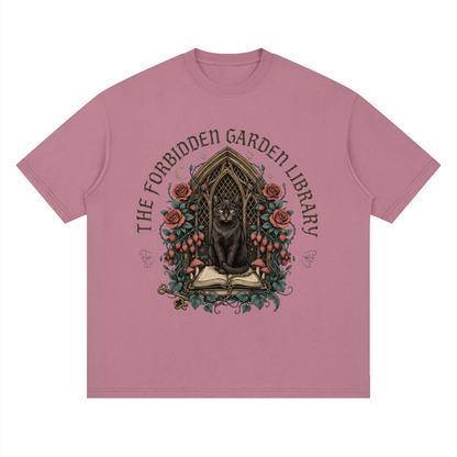 Unisex loose drop-shoulder tee with a black cat in a gothic garden library doorway, The Forbidden Garden Library front print