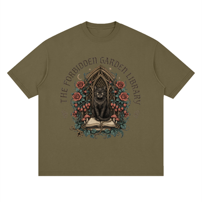Unisex loose drop-shoulder tee with a black cat in a gothic garden library doorway, The Forbidden Garden Library front print