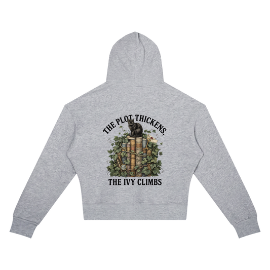 Women’s cropped drop-shoulder hoodie with a black cat on ivy-covered books, The Plot Thickens, The Ivy Climbs back print