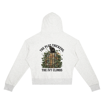 Women’s cropped drop-shoulder hoodie with a black cat on ivy-covered books, The Plot Thickens, The Ivy Climbs back print