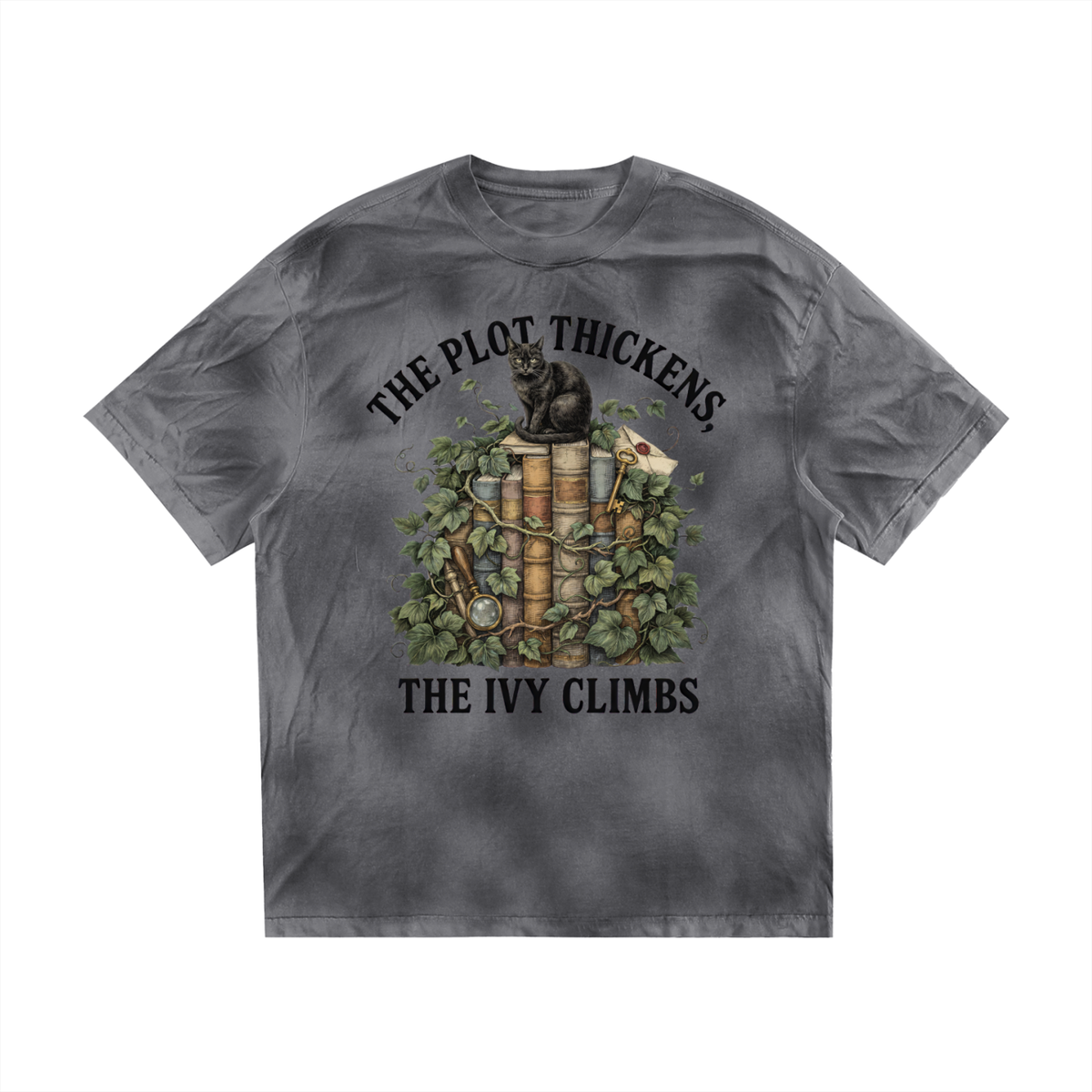 Women’s dirty-washed loose tee with a black cat on ivy-covered books, The Plot Thickens, The Ivy Climbs front print